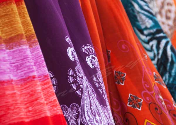 Bright, colorful cloth blowing in the wind.