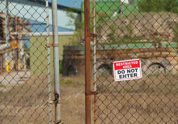 Sign for closed brick manufacturing facility in a small town, Small town USA