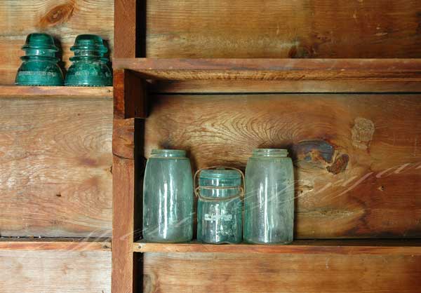 Green, glass, collectable canning jars.  Atlas jars.  Mason jars.  Green,  glass wire insulators.