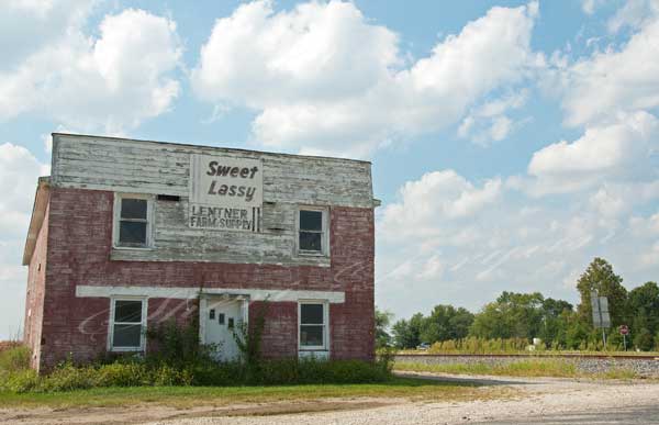Closed abandoned business in a small northern Missouri town Small town business district  Farm supply business