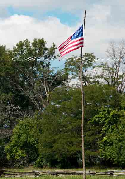 Civil War reenactment at the Centralia  Battlefield In Boone County Missouri.  Civil War era props, Flag